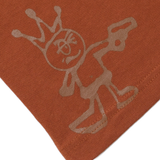 Back of a brown tee with zoomed in frame of a character wearing a crown